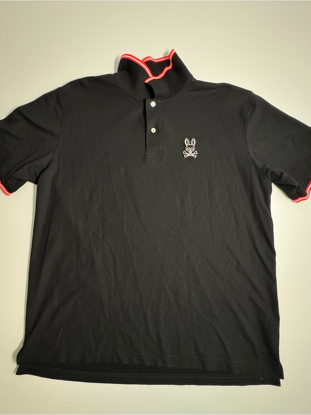Psycho Bunny Black Polo with Red Trim and Bunny Emblem